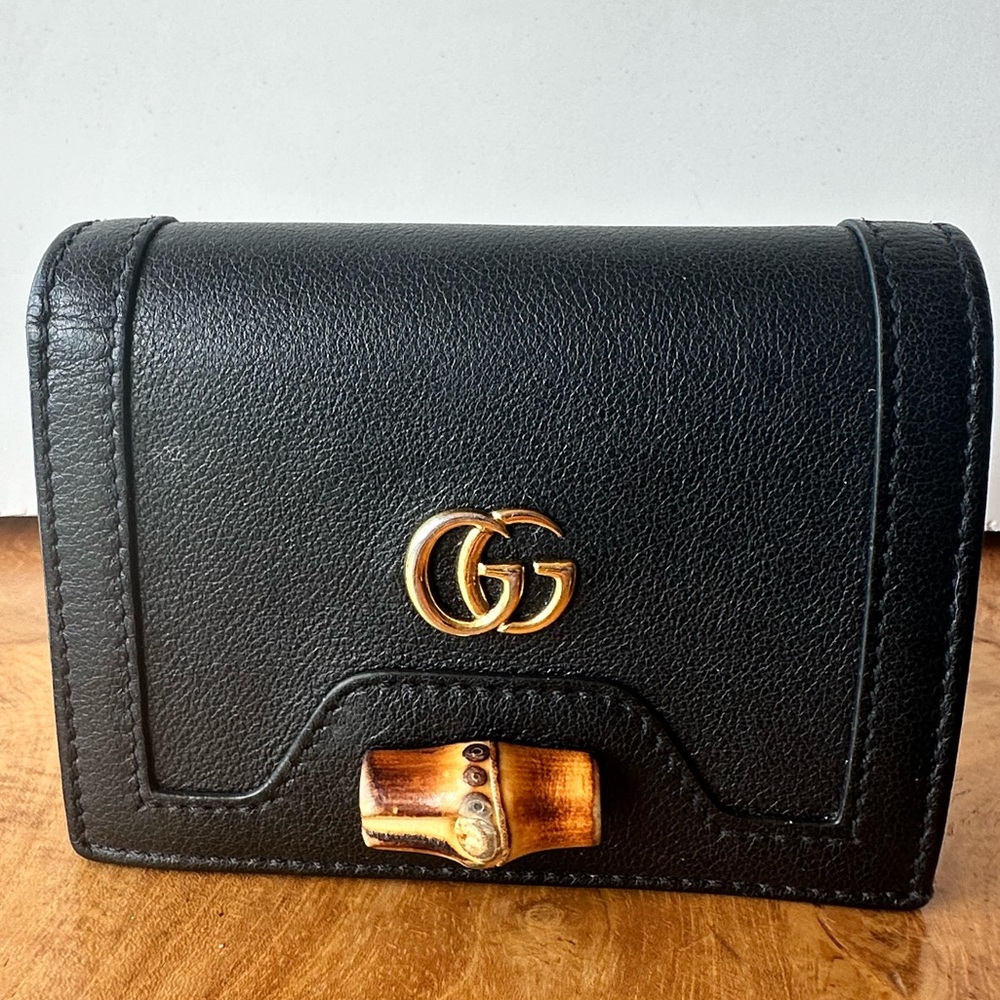 Gucci Black Leather Wallet with Gold and Brown Details
